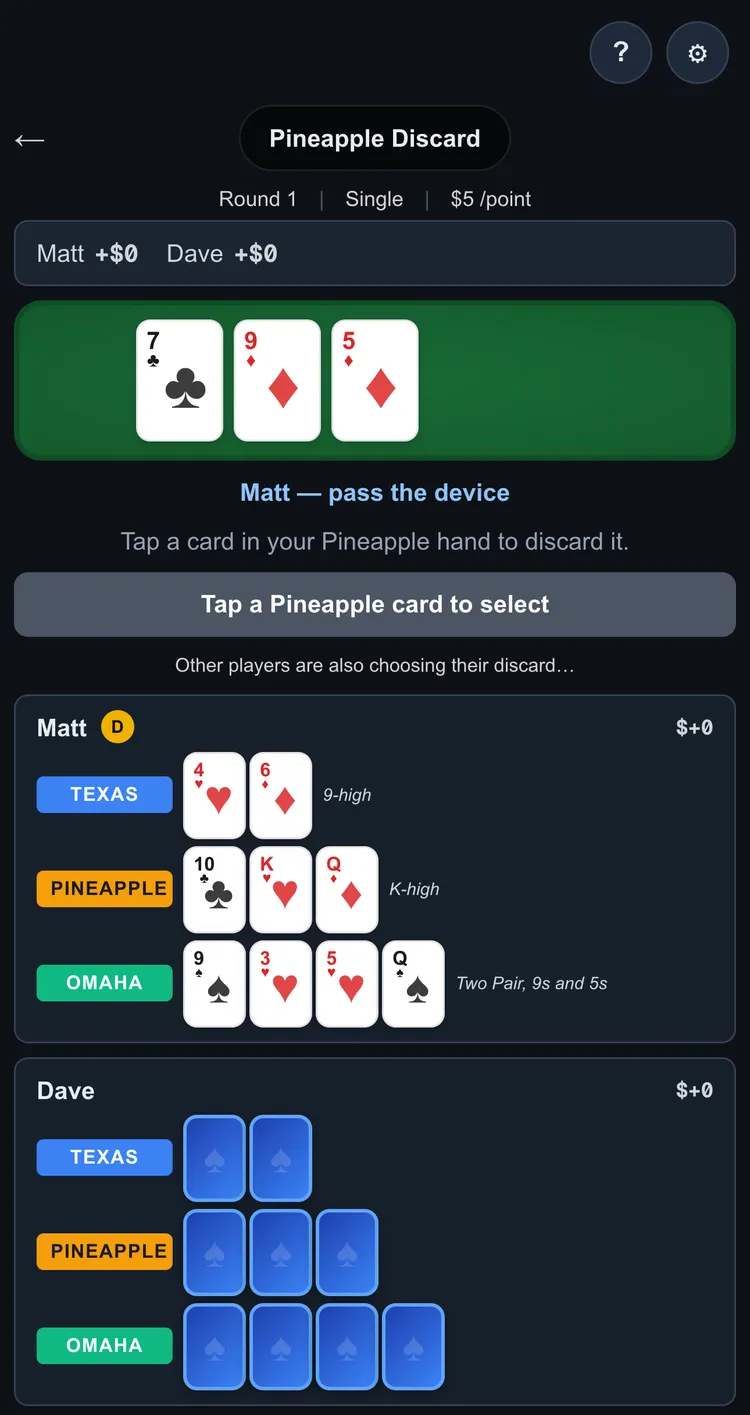The dealer completes the flop and deals one more card into each of the three hands